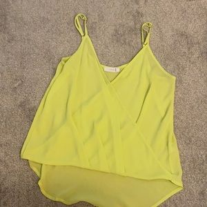Bright yellow cross over tank top.